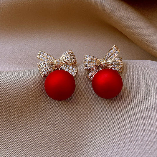 Bow Shaped Round Bead Studded Diamond Earrings
