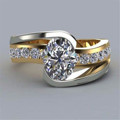 Two Tone Inlaid Goose Egg Shaped Zircon Ring